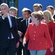 President Donald Trump, shown with NATO Secretary General Jens Stoltenberg (C) and German Chancellor Angela Merkel, has hit out at Germany over its car sales in the US, according to Der Spiegel