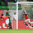 Egypt's midfielder Mahmoud Kahraba (C) celebrates with teammates after scoring a goal during the 2017 Africa Cup of Nations quarter-final football match between Egypt and Morocco in Port-Gentil on January 29, 2017