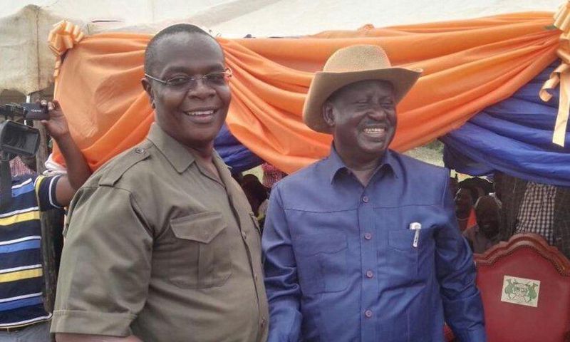 Funyula MP Paul Otuoma with ODM leader Raila Odinga.
