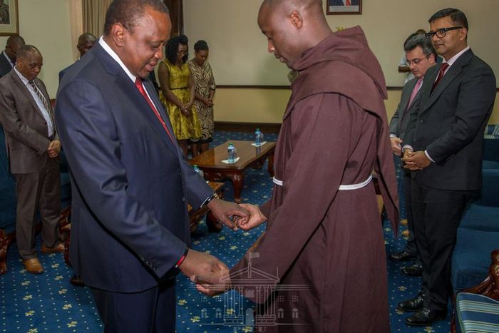 President Kenyatta with teacher Peter Tabichi