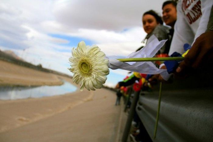 People from Ciudad Juarez protest against the politics of US President Donald Trump along the Rio Bravo, at the border between Ciudad Juarez and El Paso, Texas in February 2017