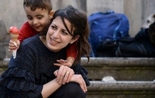Syrians Nour and her son Riad are among the 12 refugees taken in by Pope Francis from a refugee camp a year ago
