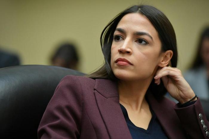 Along with Alexandria Ocasio-Cortez (c), lawmakers who signed included representatives Ilhan Omar, Rashida Tlaib, Ayanna Pressley and presidential hopeful Tulsi Gabbard