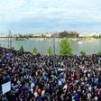 Tens of thousands demonstrated in Budapest against the controversial education legislation the day before it was signed, many chanting "Don't sign it, Janos!" and holding up placards reading "Veto!"
