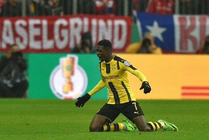 Dortmund's midfielder Ousmane Dembele celebrates after the second goal for Dortmund during the German Cup DFB Pokal semifinal football match between against Bayern Munich April 26, 2017