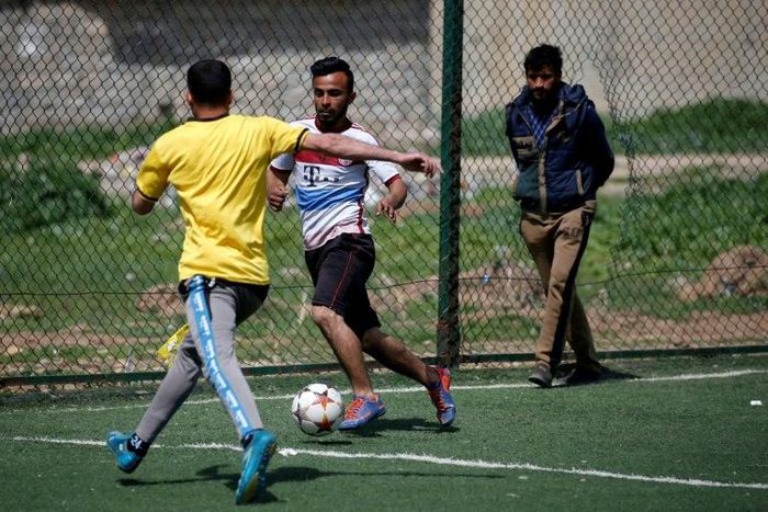 Now that eastern Mosul has been recaptured from IS jihadists, efforts are underway to rehabilitate football pitches, even as the battle for the Iraqi city's west continues on the other side of the Tigris River