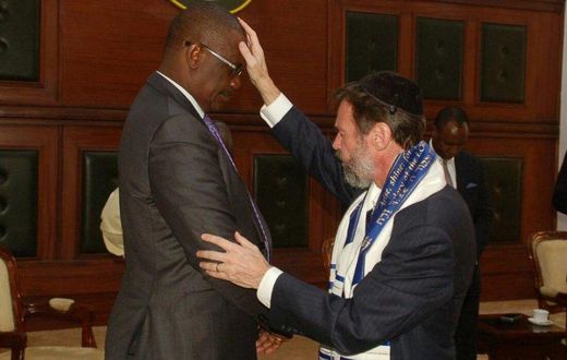 Messianic Rabbi Kirt Schneider of the Africa Divine Ministry prays for Nairobi Governor Evans Kidero at City Hall, March 21, 2017.