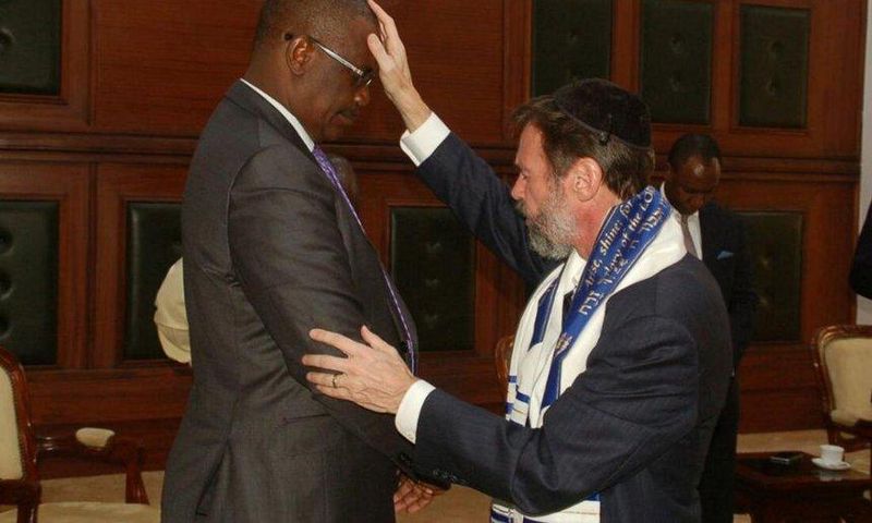 Messianic Rabbi Kirt Schneider of the Africa Divine Ministry prays for Nairobi Governor Evans Kidero at City Hall, March 21, 2017.