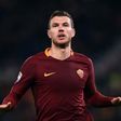 Roma's forward from Bosnia-Herzegovina Edin Dzeko celebrates after scoring during the Italian Serie A football match Roma vs Fiorentina at the Olympic Stadium in Rome on February 7, 2017
