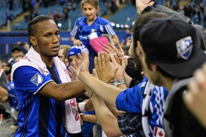 Didier Drogba of the Montreal Impact celebrates with fans during leg one of the MLS Eastern Conference finals against the Toronto FC at Olympic Stadium on November 22, 2016 in Montreal, Quebec, Canada
