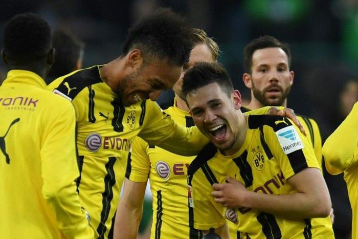 Dortmund's defender Raphael Guerreiro and striker Pierre-Emerick Aubameyang react after a German first division Bundesliga football against Borussia Moenchengladbach on April 22, 2017