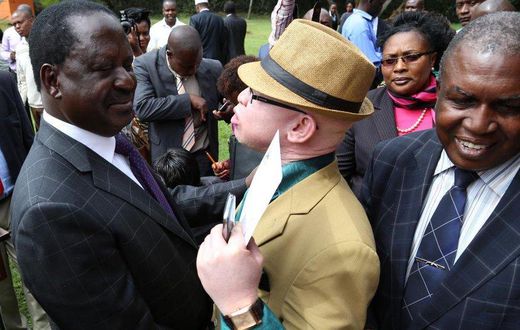 ODM leader Raila Odinga and nominated MP Isaac Mwaura
