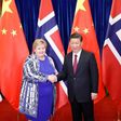 Chinese President Xi Jinping shakes hands with Norway's Prime Minister Erna Solberg at the Great Hall of People in Beijing on April 10, 2017