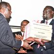Governor Josphat Nanok hands over the instruments of power shortly after Governor oparanya was elected CoG chair (Twitter)