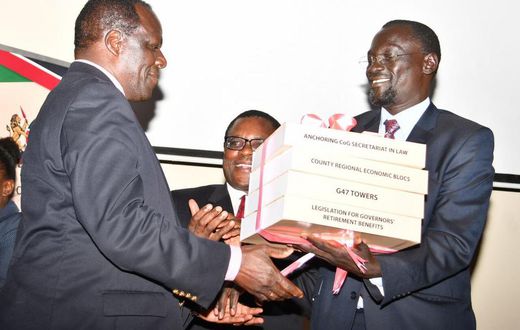 Governor Josphat Nanok hands over the instruments of power shortly after Governor oparanya was elected CoG chair (Twitter)