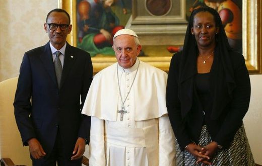 Pope Francis (centre) poses with Rwanda's President Paul Kagame and his wife Jeannette Kagame ahead of a meeting at the Vatican March 20, 2017