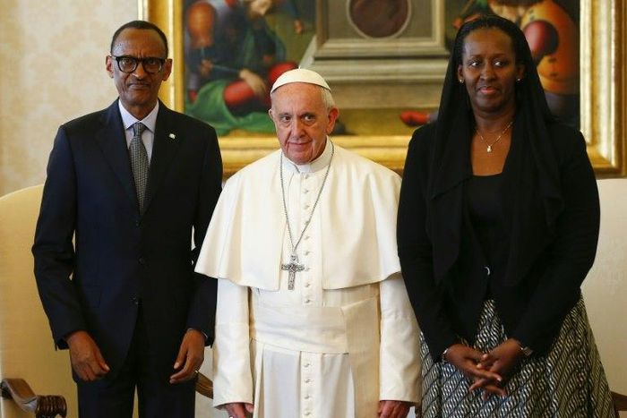 Pope Francis (centre) poses with Rwanda's President Paul Kagame and his wife Jeannette Kagame ahead of a meeting at the Vatican March 20, 2017