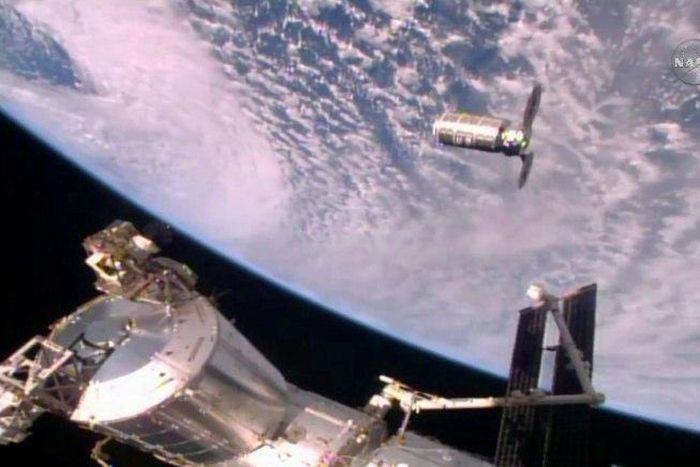 The Cygnus resupply ship slowly approaches the International Space Station in October 2016
