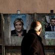 French presidential candidates Emmanuel Macron and Marine Le Pen are at odds on many issues