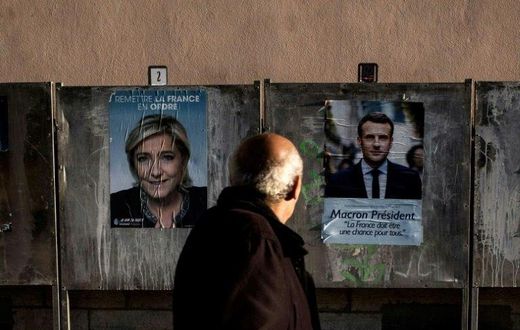 French presidential candidates Emmanuel Macron and Marine Le Pen are at odds on many issues