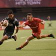 New Zealand (in black) and Canada compete during the HSBC Canada Sevens Vancouver tournament, at BC Place Stadium, on March 11, 2017
