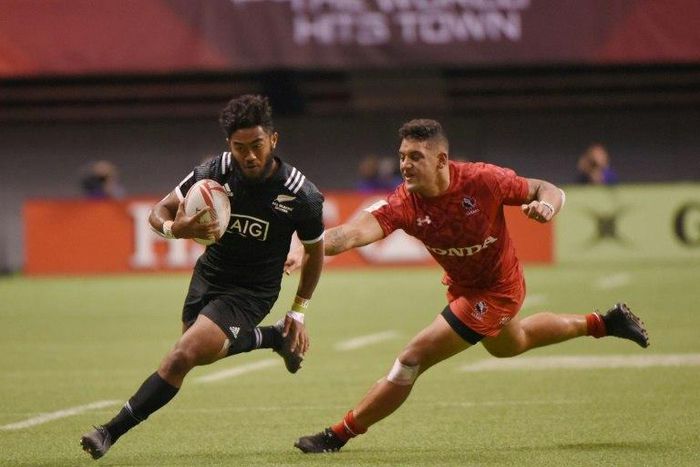 New Zealand (in black) and Canada compete during the HSBC Canada Sevens Vancouver tournament, at BC Place Stadium, on March 11, 2017