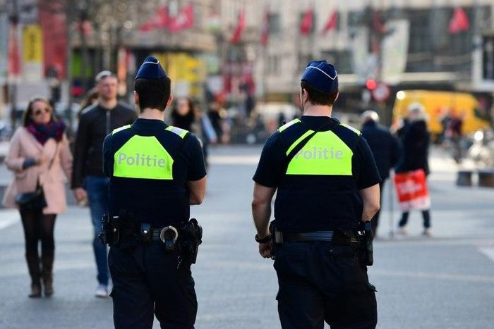 Policemen patrol in the Belgian city of Antwerp on March 23, 2017