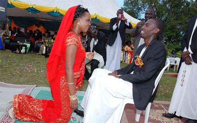 Woman showing respect to her husband (Courtesy)