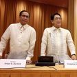 Philippines' Presidential Advisers on the Peace Process Jesus Dureza (L) and Silvestre H. Bello III take part in a meeting as part of the peace talks between the Government of the Philippines and the NDF on April 2, 2017