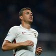 AS Roma's forward from Bosnia-Herzegovina Edin Dzeko reacts during the Italian Serie A match against AC Milan at the San Siro stadium in Milan on Mai 7, 2017