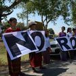 Anti-Rohingya protesters rally at Yangon's Thilawa port as the Malaysian ship carrying relief aid for Rohingya Muslims arrives on February 9, 2017