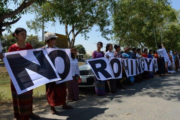 Anti-Rohingya protesters rally at Yangon's Thilawa port as the Malaysian ship carrying relief aid for Rohingya Muslims arrives on February 9, 2017