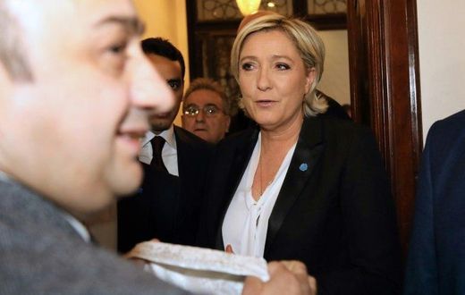 France's far-right presidential candidate Marine Le Pen rejects a headscarf ahead of her meeting with Lebanon's Grand Mufti Sheikh Abdullatif Deryan in Beirut on February 21, 2017
