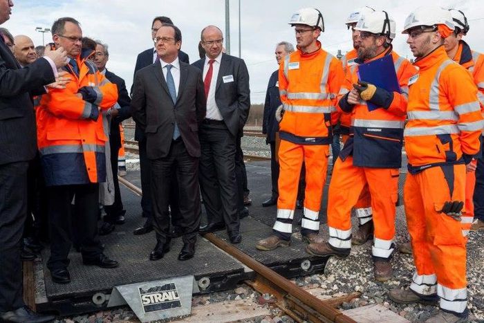 French President Francois Hollande attends the inauguration of the new Sud Europe Atlantique high-speed rail line, linking Tours and Bordeaux, on February 28, 2017, in Villognon, where two were injured when a police officer accidentally fired his gun