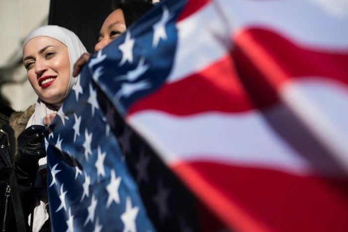 Zeina, who did not want to give her last name, takes part in a protest against US President Donald Trump outside the White House on February 4, 2017, in Washington, DC