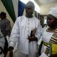 Evangelical preacher Emmanuel Momoh, seen attending an auction in Freetown with his wife, says the massive diamond he uncovered is worth $50 million, seven times the top bid, prompting the government to seek higher offers in Belgium