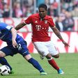 Darmstadt’s Fabian Holland (left) and Bayern Munich's Douglas Costa in action during a Bundesliga match in Munich, on May 6, 2017
