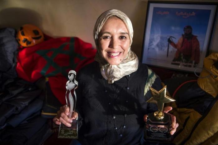 Bouchra Baibanou at home with two of her mountaineering trophies in the Sidi Moussa district of Sale near the capital Rabat