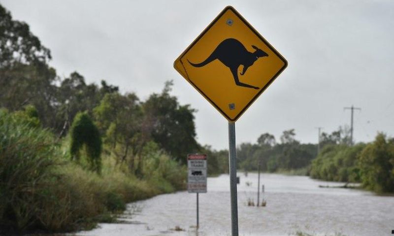 Torrential rain is hampering relief efforts after a powerful cyclone wreaked havoc in northeast Australia, with floods sparking emergency rescues as fed-up tourists wait to be evacuated from resort islands