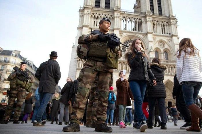 French soldiers patrol outside Notre Dame de Paris cathedral in December 2015