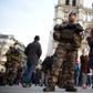 French soldiers patrol outside Notre Dame de Paris cathedral in December 2015