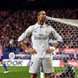 Real Madrid's forward Cristiano Ronaldo celebrates after scoring his third goal on November 19, 2016