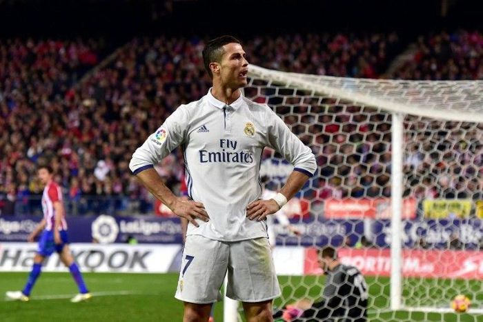 Real Madrid's forward Cristiano Ronaldo celebrates after scoring his third goal on November 19, 2016