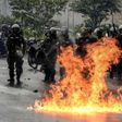 The Venezuelan National Guard stands guard as they clash with opposition activists clash in Caracas on April 13, 2017