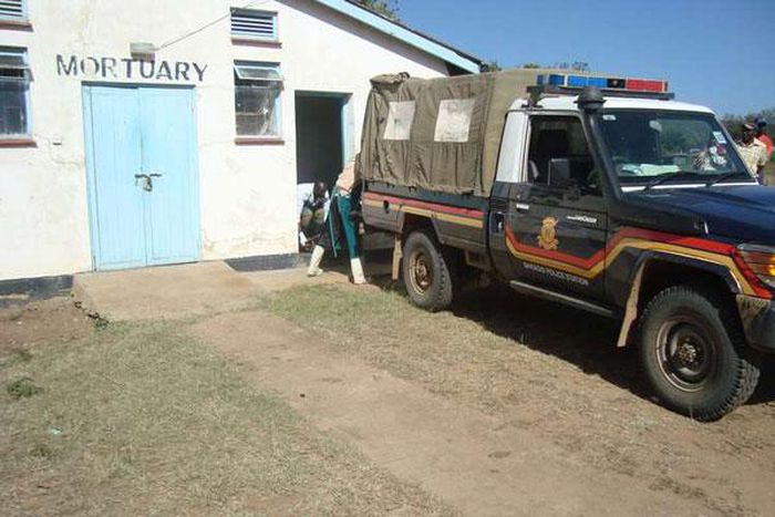 Police van outside a Mortuary