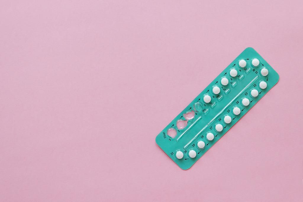 High Angle View Contraceptive Pill Over Pink Background