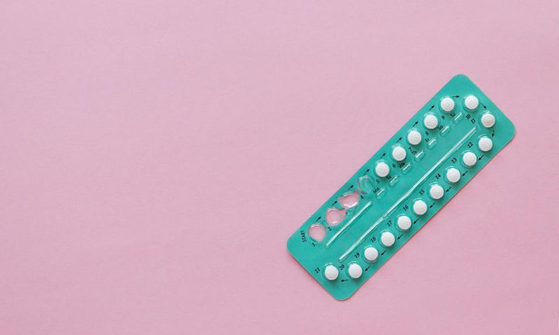 High Angle View Contraceptive Pill Over Pink Background