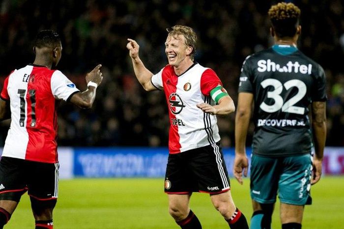 Dirk Kuyt of Feyenoord Rotterdam celebrates the 3-0 score with his teammates during the Dutch Eredivisie soccer match in Rotterdam on April 5, 2017