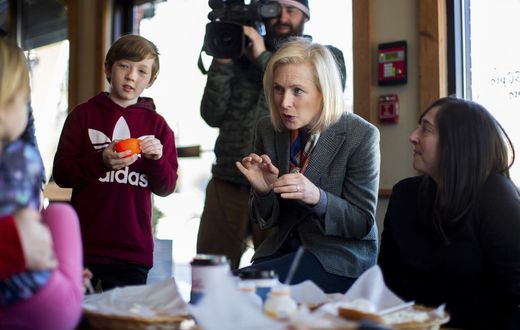 Clinton Isn't a Candidate, but Her Shadow Is Inescapable