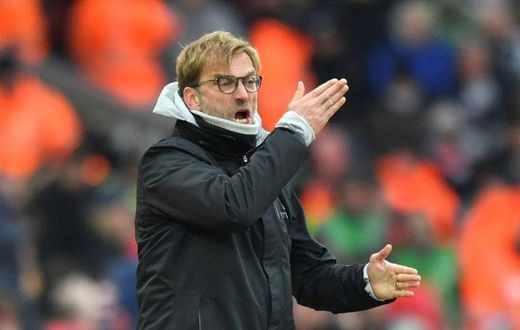 Liverpool manager Jurgen Klopp gestures on the touchline during the English Premier League match against Swansea City at Anfield in Liverpool, north west England on January 21, 2017